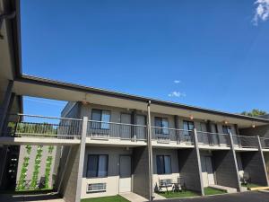 an exterior view of a building with balconies at FairBridge Inn Express Billings Airport in Billings