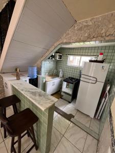 Η κουζίνα ή μικρή κουζίνα στο MARAGOGI FLAT BEIRA MAR