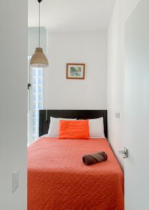 Giường trong phòng chung tại Narama 2 - Airport apartment - Guatemala City