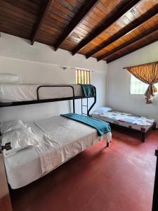 Ένα ή περισσότερα κρεβάτια σε δωμάτιο στο Casa Llanitos de Tabay de Mérida