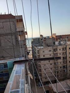 a view from the top of a building with tall buildings at Enjoy 2025 in Alexandria