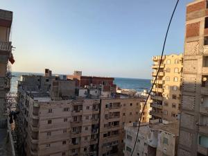 a group of buildings with the ocean in the background at Enjoy 2025 in Alexandria +10 photos