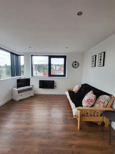 Posezení v ubytování Penthouse Nottingham Apartment