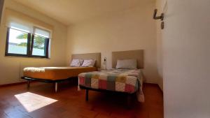Una cama o camas en una habitación de Villa UM