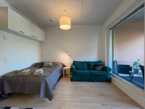 Posezení v ubytování Peaceful stay near city & nature, Wifi, balcony