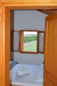 Postel nebo postele na pokoji v ubytování Villa Mara - secluded house with breathtaking view- Seline, Starigrad Paklenica