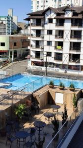 Kolam renang di atau dekat dengan Excepcional Apartamento em Piratuba - SC