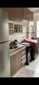 Køkken eller tekøkken på Condomínio Ideal Br - COP 30