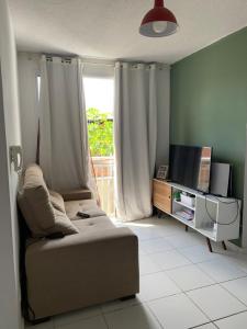 Et tv og/eller underholdning på Condomínio Ideal Br - COP 30 + 6 billeder