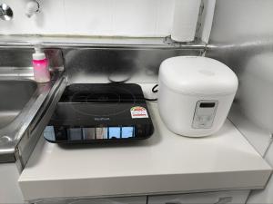 ソウルにあるGangnam Willow Stay#Gangnam#COEX#Concert KSPO#강남세브란스병원#대치동학원가の洗面台の横のカウンターに座る器具