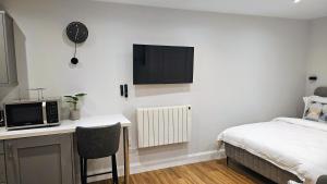 TV a/nebo společenská místnost v ubytování Taylors Lodge