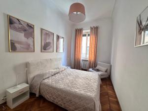 Ένα ή περισσότερα κρεβάτια σε δωμάτιο στο Casa Torino - elegant apt in the hurt of the centre