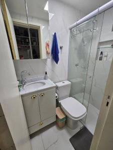 Koupelna v ubytování Cantinho Sol&Dan - 1 quarto em apto familiar