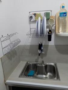 Kuchyň nebo kuchyňský kout v ubytování AP no centro de Teresópolis - Perto de tudo! + 13 fotografií