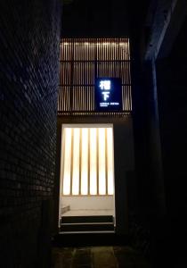 Μια τηλεόραση ή/και κέντρο ψυχαγωγίας στο Liuxia Heshun Inn +4 φωτογραφίες