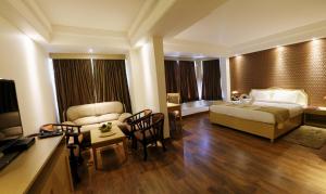 Khu vực ghế ngồi tại Dee Marks Airport Hotel & Resorts