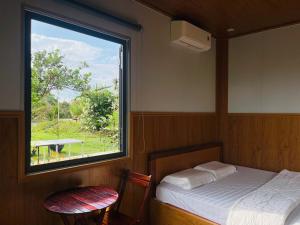 Postel nebo postele na pokoji v ubytování Mây's garden camping