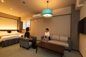 TV a/nebo společenská místnost v ubytování Hotel Matsunoi Shurin + 31 fotografií