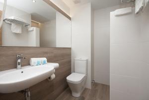 Koupelna v ubytování Hotel Perla