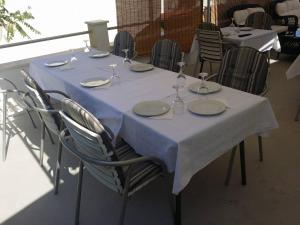 Reštaurácia alebo iné gastronomické zariadenie v ubytovaní Vila Angela