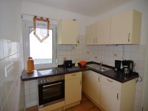 Η κουζίνα ή μικρή κουζίνα στο Chalet im Sauerland nahe Skigebiet Winterberg