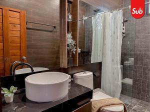 a bathroom with a sink and a toilet and a shower at Family Pool Villa, BBQ with Warm Welcome in Ban Nok