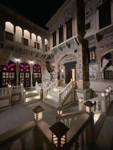 an inside view of a building with lights at Hotel Mandawa Vilas in Mandāwa