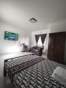 Katil atau katil-katil dalam bilik di JKCC Family Pad