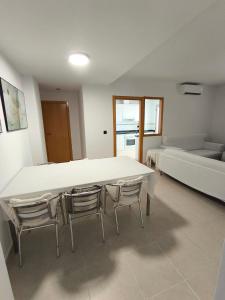 Ένα ή περισσότερα κρεβάτια σε δωμάτιο στο Apartamento Playa Pinar Golf