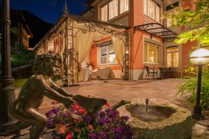 Vonkajšia záhrada v ubytovaní Hotel Luis