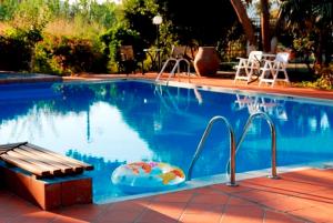 The swimming pool at or close to Kalives Apartments