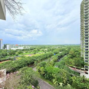 an aerial view of a city with palm trees and a road at Regalia Park 2B1R 3pax Near Beach Forest City GB A-1202 in Gelang Patah +3 photos