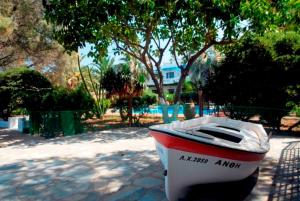 A garden outside Kalives Apartments