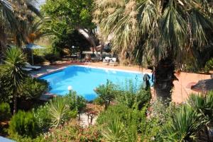 The swimming pool at or close to Kalives Apartments