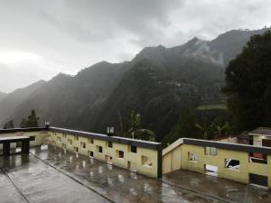 a building with a view of a mountain at Tengger Bromo Villa by ABM in Ngadisari