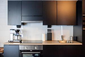 Nhà bếp/bếp nhỏ tại Villa Aikku +12 ảnh