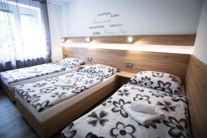 Postel nebo postele na pokoji v ubytování Ubytování v Brně - Schodová