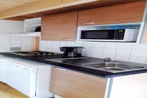 Kuchyň nebo kuchyňský kout v ubytování Apartment on Île d'Oléron near Beach + 5 fotografií