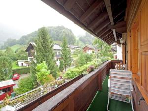 a balcony with a view of a garden at Apartment in Tschagguns near Ski Slopes in Tschagguns