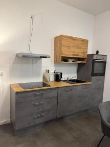 a kitchen with a sink and a counter top at Ferienwohnung Alina in Werne an der Lippe