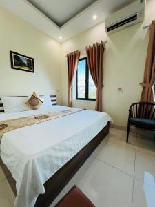 Postel nebo postele na pokoji v ubytování Tam Coc Hung Ha Homestay