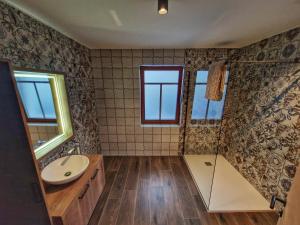 a bathroom with a sink and a mirror at Alpine House Mina - Rooms & Apartments in Bled +38 photos