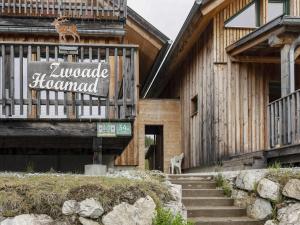 a building with a sign that reads jungle hazard at Chalet in Hohentauern am Skilift in Hohentauern