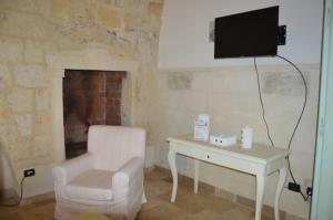 TV a/nebo společenská místnost v ubytování Agriturismo Tenuta Mazzetta
