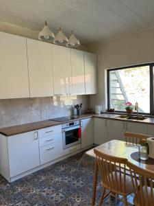 Η κουζίνα ή μικρή κουζίνα στο Apartment MILU +26 φωτογραφίες