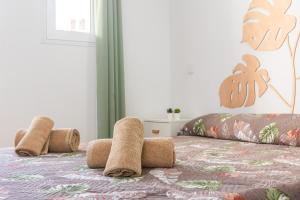 Ένα ή περισσότερα κρεβάτια σε δωμάτιο στο Gran Sol Family 1