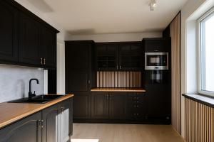 Kuchyň nebo kuchyňský kout v ubytování Top floor Helsfyr city central apartment