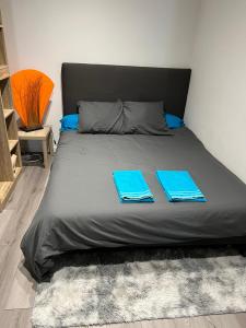 Giường trong phòng chung tại Magnifique Seb cocooning