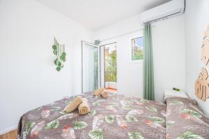 Ένα ή περισσότερα κρεβάτια σε δωμάτιο στο Gran Sol Family 2 +15 φωτογραφίες