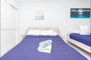 Ένα ή περισσότερα κρεβάτια σε δωμάτιο στο UNIT #908 Castle Beach Club Condominium +37 φωτογραφίες